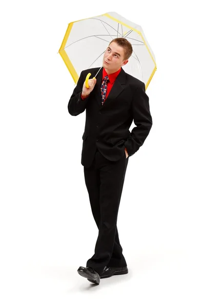 Empresário alegre andando com guarda-chuva — Fotografia de Stock