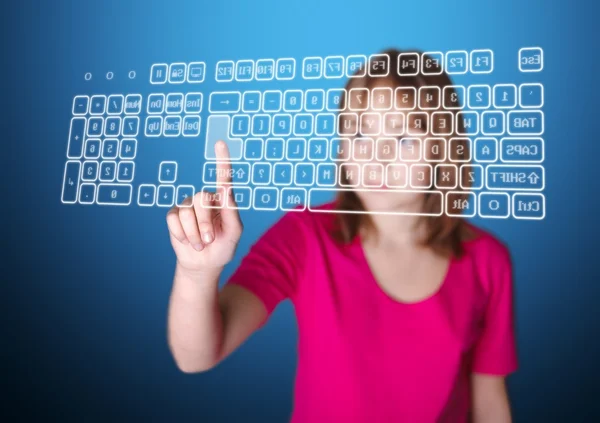 Girl pressing enter on virtual keyboard — Stock Photo, Image