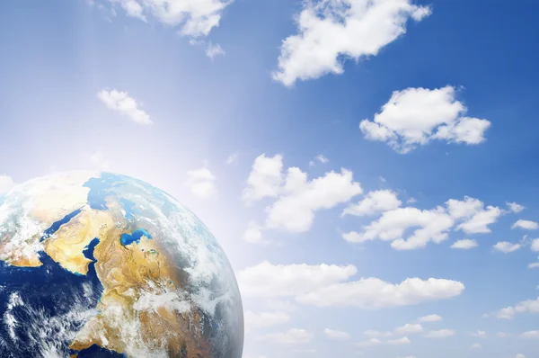 Blue sky and planet earth — Stock Photo, Image