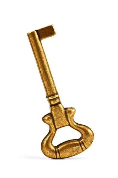 Золотой ключ на белом — стоковое фото