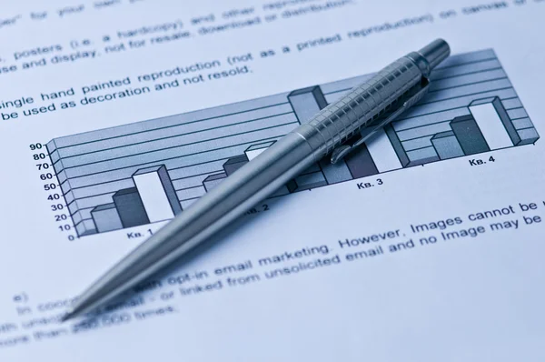 Financial document and pen — Stock Photo, Image