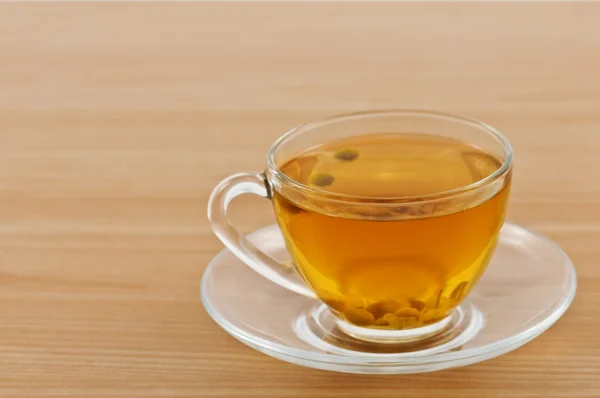 Tea cup on wood table — Stock Photo, Image