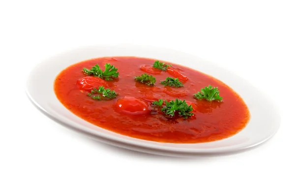 Red tomato soup on white background — Zdjęcie stockowe