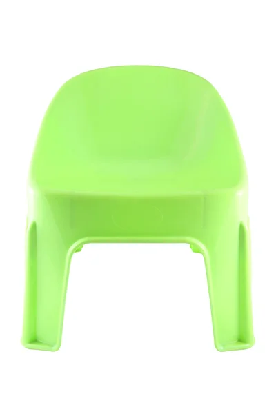 Пластиковый короткий зеленый стул — стоковое фото