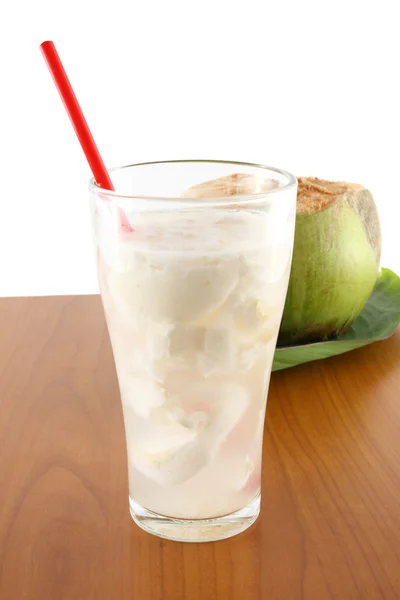 Coconut juice on table Stock Photo
