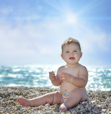 Little girl on beach clipart