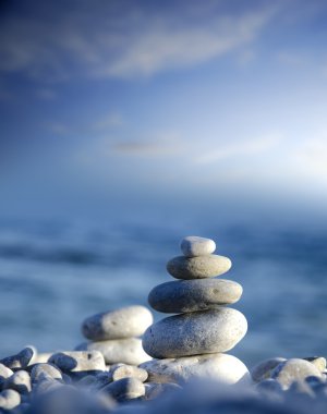 Pebble stack signifying harmony and balance clipart