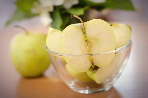 Apple in glass bowl Stock Image