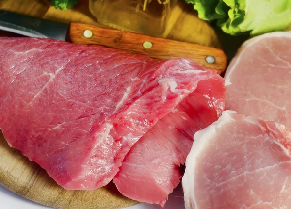 Hús és a kést a fedélzeten — Stock Fotó