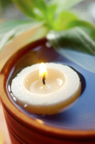 Candle in water — Stok fotoğraf