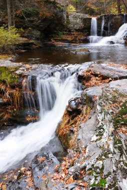 Autumn Waterfall in mountain clipart