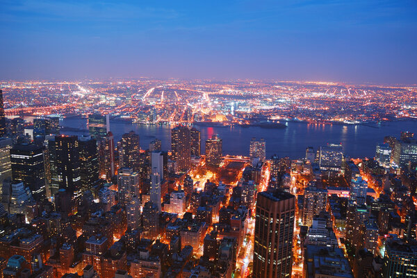New York City Manhattan skyline aerial view panorama with Brooklyn and Hudson east river at sunset.