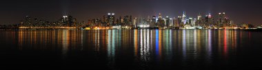 New York City Manhattan midtown skyline at night clipart