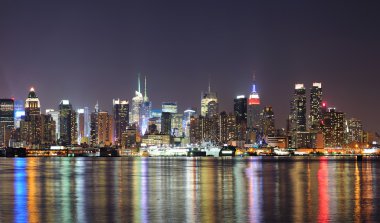 New York City Manhattan midtown skyline at night clipart