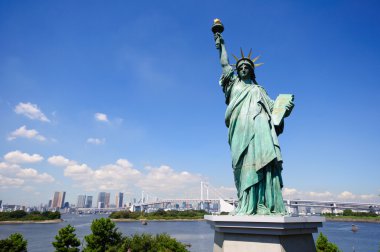 Statue of Liberty and Tokyo Skyscrapers clipart