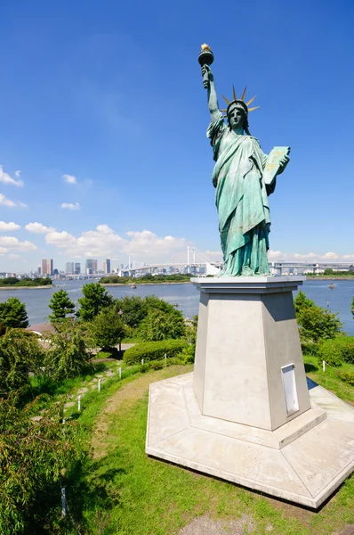 stock image Statue of Liberty and Tokyo Skyscrapers