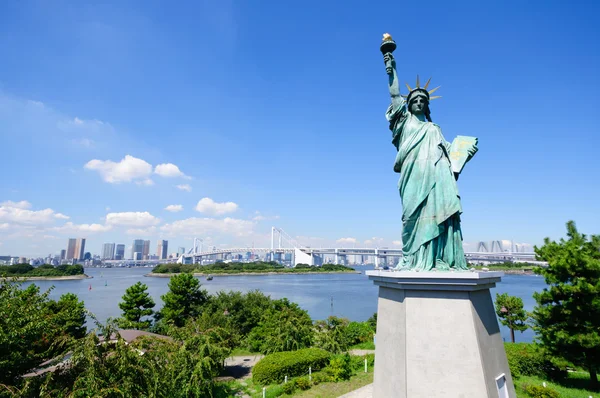 stock image Statue of Liberty and Tokyo Skyscrapers