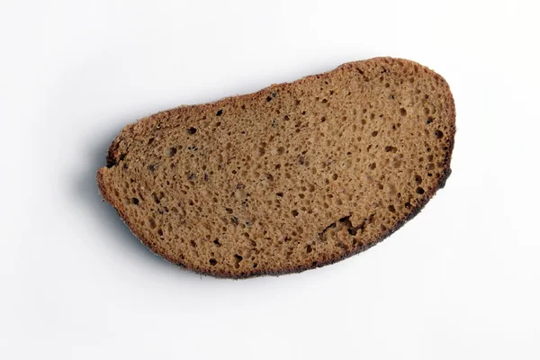 Ломтик хлеба на белом фоне . — стоковое фото