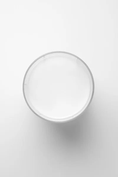 A glass of milk on a white background. — Stock Photo, Image
