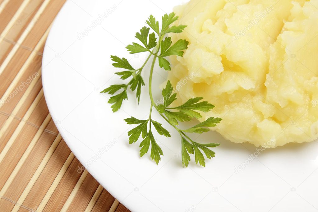 Mashed potatoes on a white plate