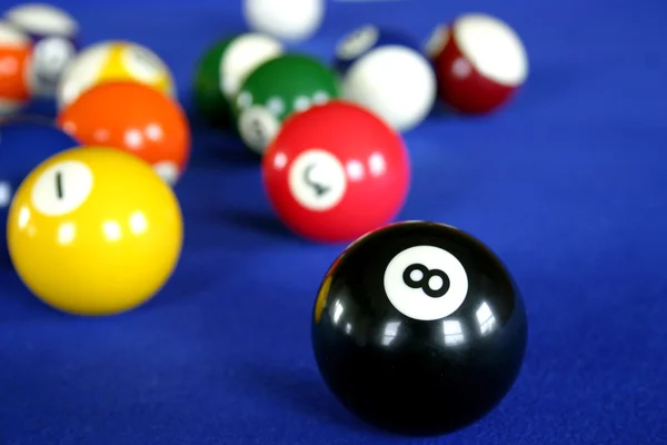 Pool balls on blue pool table — Stock Photo, Image