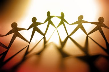 Group of holding hands together clipart
