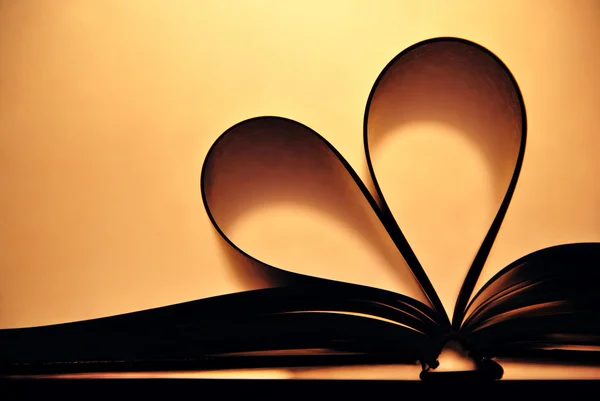 Heart in book — Stock Photo, Image