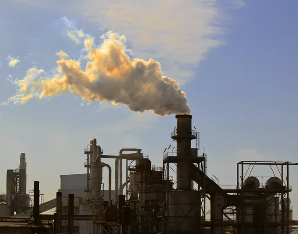 Stock image Air pollution by one big chimney of a factory