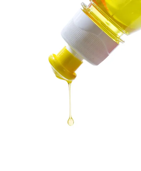 Una gota de detergente amarillo Imagen de stock