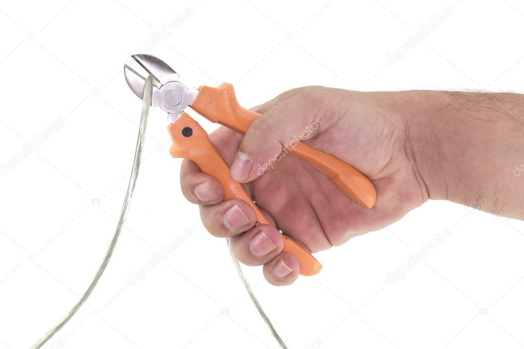 Hand with pliers cutting a wire