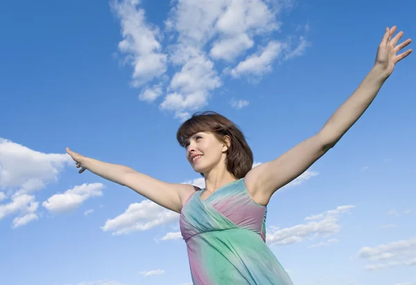 Girl over sky background — Stock Photo, Image