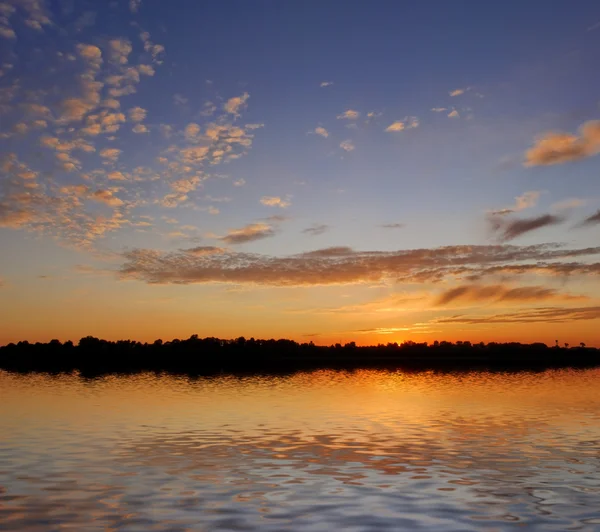 stock image Sunset over big lake