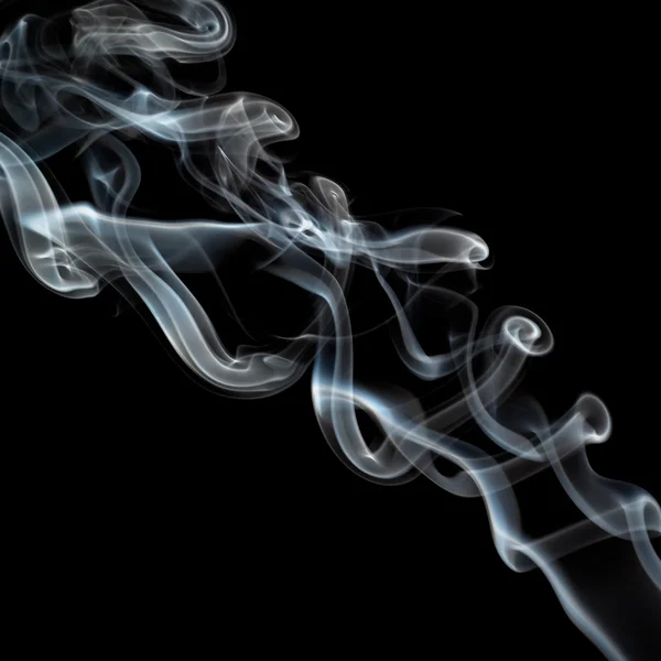 stock image Twisting smoke on black