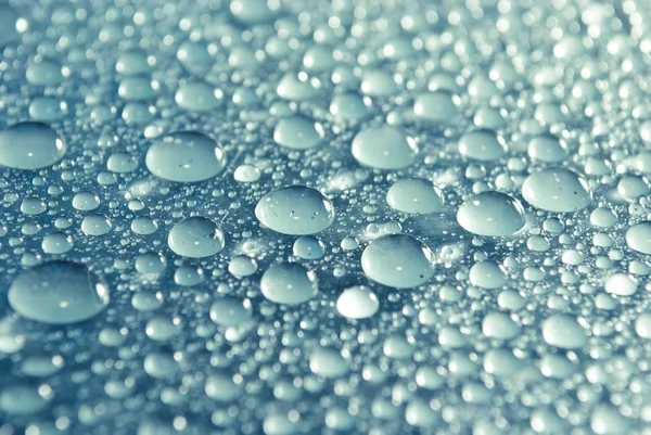Gotas de agua azul claro —  Fotos de Stock