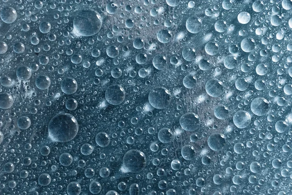 Grandes gotas de agua azul profundo —  Fotos de Stock