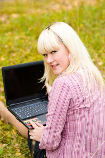 stock image Business woman on the nature with the laptop