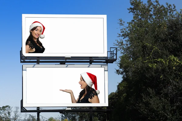 Çift reklam panoları ile bir güzel Noel Baba'nın yardımcı — Stok fotoğraf