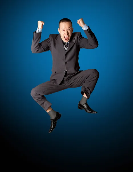 Jumping boldog üzletember — Stock Fotó