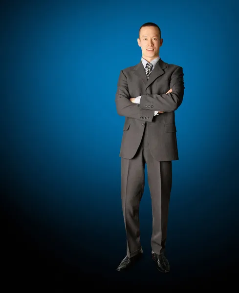 Ler stående affärsman i kostym — Stockfoto