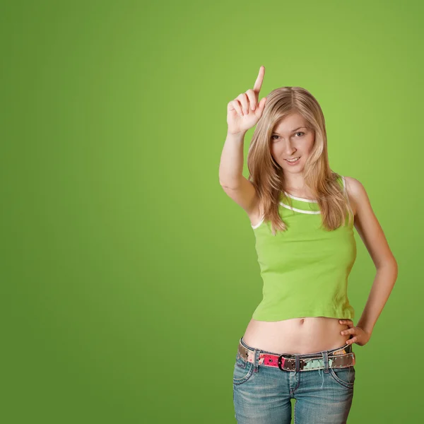 Junge Frau mit erhobenem Zeigefinger — Stockfoto