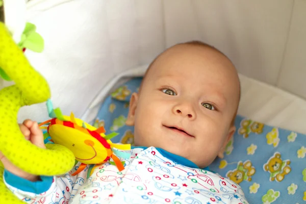 Lindo bebé con juguetes —  Fotos de Stock