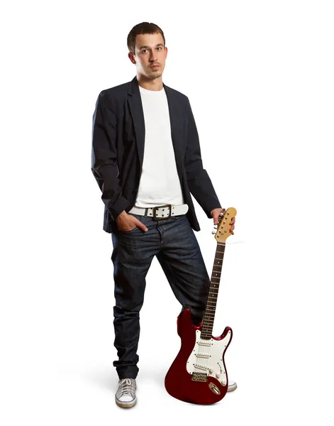 Hombre con estilo con la guitarra mirando a la cámara —  Fotos de Stock
