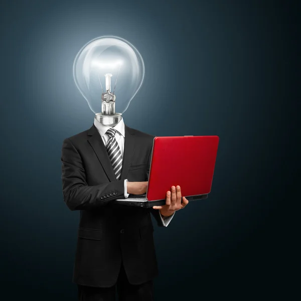 Lampa huvud affärsman med laptop — Stockfoto