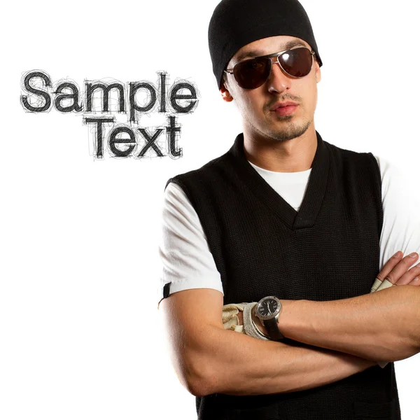 Man in glasses and hat looking at camera — Stock Photo, Image