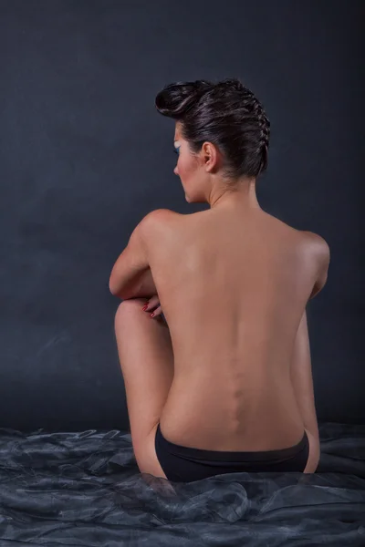 Young woman with naked back — Stock Photo, Image