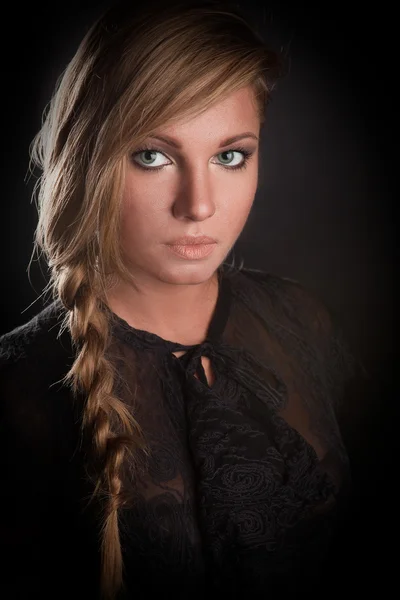 Attractive girl on dark background — Stock Photo, Image