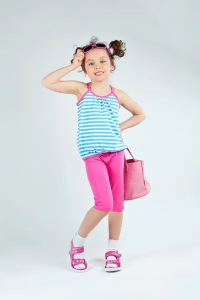 Little girl posing in studio — Stock Photo, Image