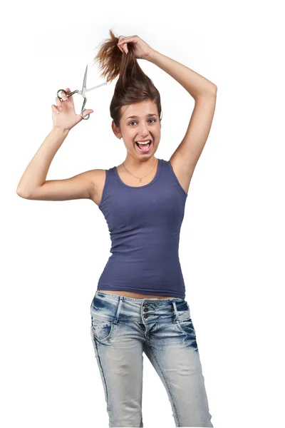 Portrait of brunette young woman cutting her hair — Stock Photo, Image