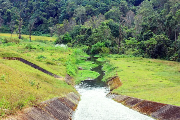 Stock image Dam water running through spillway