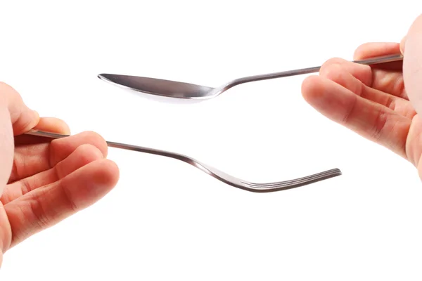 Vidlička a lžíce v rukou — Stock fotografie
